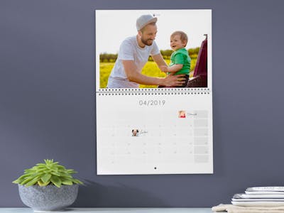 A birthday calendar with entries and photos in the date cell A birthday calendar with entries and photos in the date cell